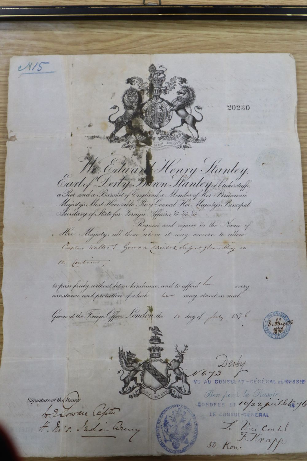 Russian Interest: British foreign office travel pass to Captain Walter E Gowan with Russian authorisation stamps dated 1876, frame 47 x